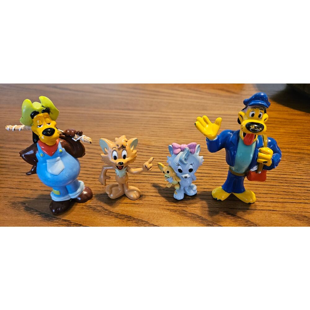 PAW ISLAND PAL COLLECTIBLE VINYL ACTION FIGURES from 1999 LOT OF 4